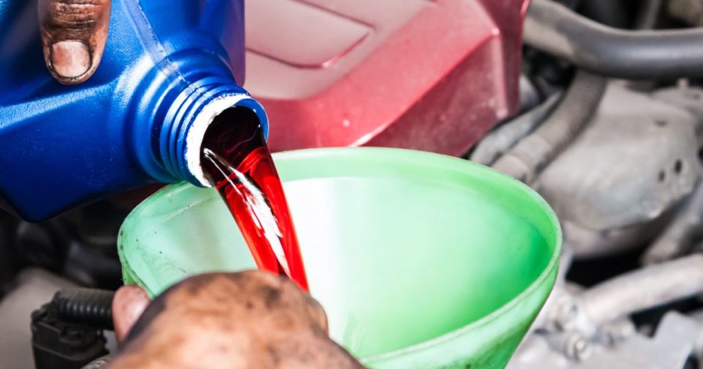 pouring transmission fluid